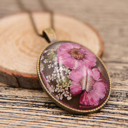 Real Flower Resin Ellipse Pendant Necklace Bronze Tone