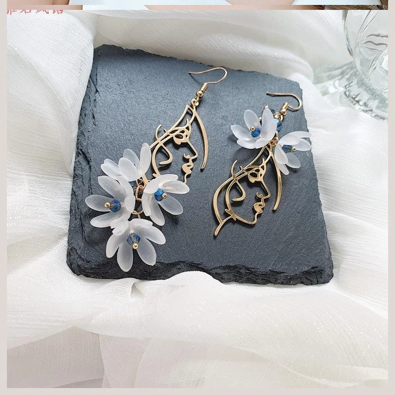 Woman Face Earrings with Gentle Flowers